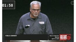 Eric Carroll wearing a work shirt